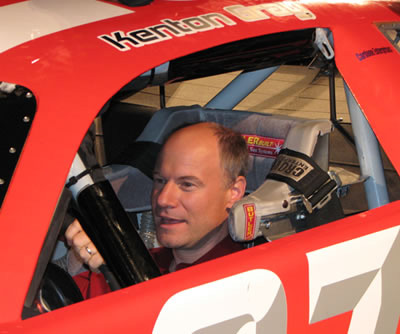 Jim Meskimen in the race car