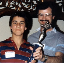 Young Kenton Gray with go-kart racing trophy