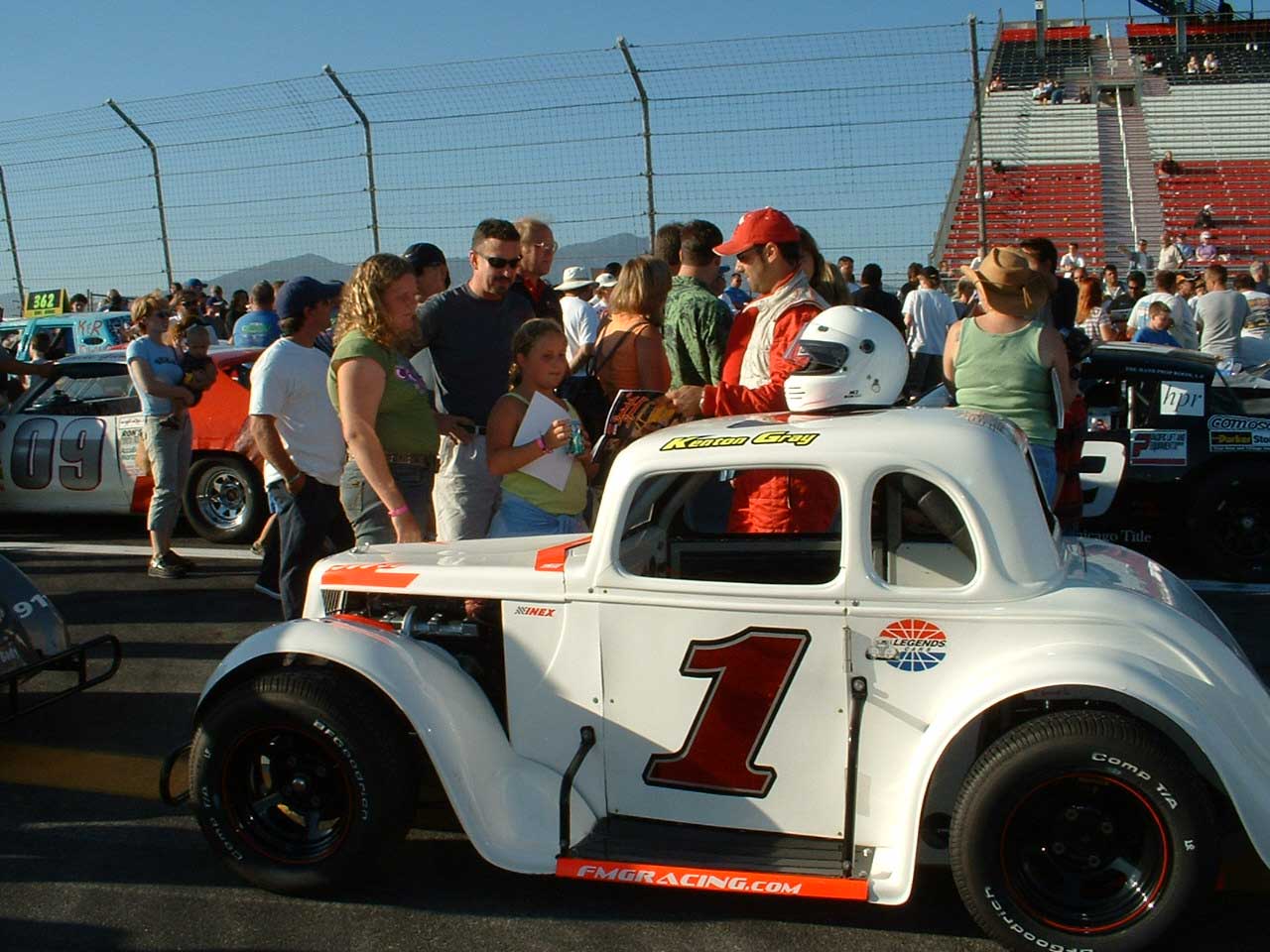 Kenton Gray with #1 Legend car meeting fans on race day
